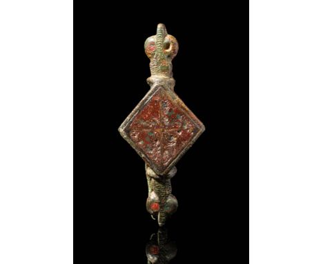 Ca. AD 100 - 300.A Roman bronze enamelled brooch with square panel. It is decorated on the edges with enamel red dots. For si