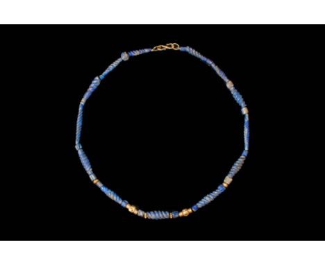 Ca. 800 - 600 BC.A Mesopotamian necklace with gold and polygonal lapis lazuli beads. For similar see: Efes Artemision, Kunst 