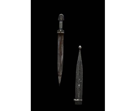 Caucasus region possibly Chechnya or Dagestan, Ca. AD 1800 - 1900.A very fine steel kindjal dagger featuring a long double-ed