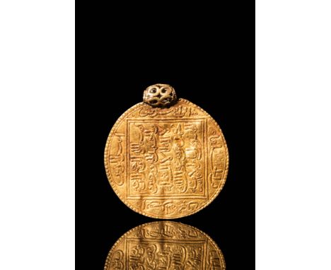 Ca. AD 1100 - 1200.An Islamic 23.5 ct gold coin pendant with inscriptions. Inscriptions can be found on both faces of the pen