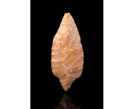 Ca. BC 7000 - 5000 .A Neolithic flint arrow point, almond shaped. For similar see: Christie's, Live Auction 10372, Antiquitie