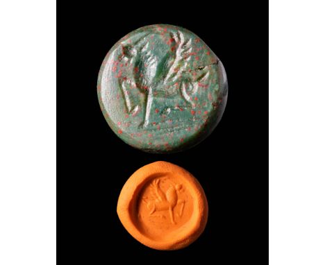 Ca. AD 200 - 500.A Sasanian stamp seal depicting a stylised winged horse. The seal has a globular body with a horizontally dr