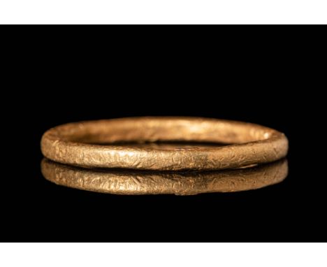 Ca. AD 900 .A Viking/Saxon gold solid ring in a simple hoop. Rings in barbarian societies, especially gold ones, were an unmi