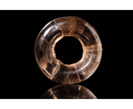 New Kingdom, Ca. 1550 - 1069 BC.An Egyptian rock crystal hair ring with circular shape, in an amazing a translucent colour wi
