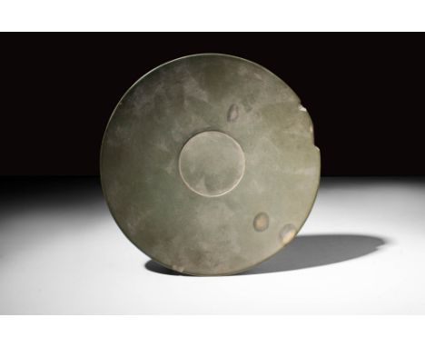 Early Dynastic Period, Ca. 3100 - 2700 BC.An Egyptian greywacke bowl with shallow form, an inverted rim and central round dep