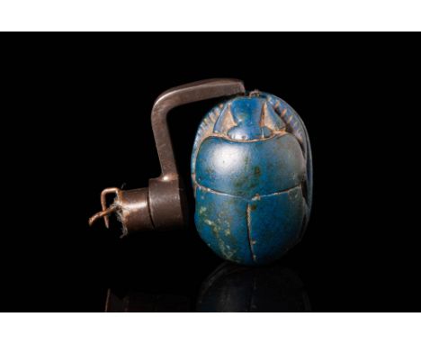 Third Intermediate to Late Period, Ca. 688 - 525 BC.A stunning Lapis lazuli scarab amulet. The topside displays characteristi
