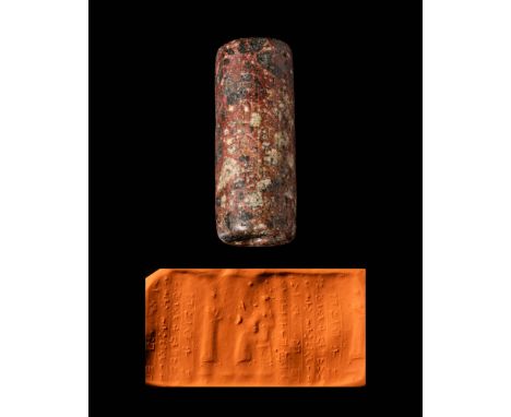 Ca. 1400 - 1100 BC.A Babylonian Cassite cylinder seal depicting a bearded, seated god wearing a long robe and raising a hand.