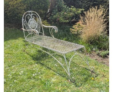 A white painted metal garden day bed
