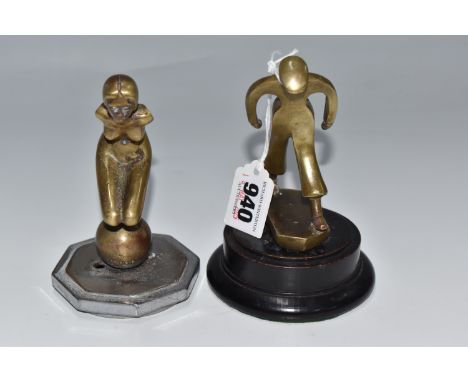 A DESMO CAR MASCOT AND A SIMILAR FIGURE,  the car mascot in the form of a female figure crouching on a ball, stamped Desmo on