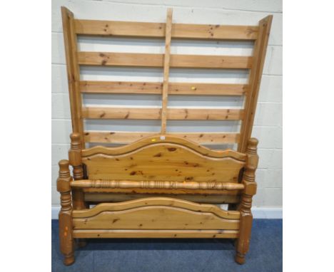 A MODERN PINE 4FT6 BEDSTEAD, with side rails, slats, and a central support bar, condition report: marks, scuffs, missing supp