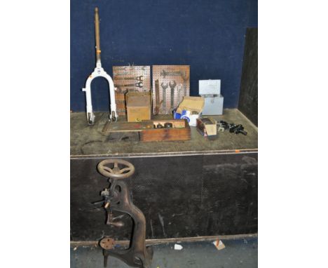 A COLLECTION OF AUTOMOTIVE TOOLS AND PARTS including a Lambretta front fork set, a vintage manual drill press, a Lucs alterna
