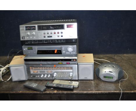 A COLLECTION OF AUDIO VISUAL EQUIPMENT including a Rotel RX-304 receiver amplifier, Sony DVD player with remote, a Sony VHS r