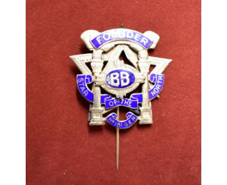 Masonic Founders badge or jewel in gilt and enamel 'Founders' in a scroll above, 'BB' central and 'Star of the North' in a sc