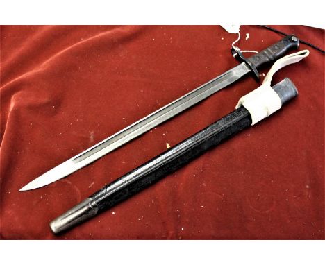 Remington made Pattern 1913 bayonet, with stamps on the ricasso 10/16 (Remington) and on the other side C2 A surmounted by a 