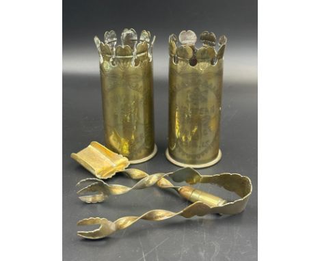 Trench Art from WWI to include sugar shovel and tongs, holders inscribed Souvenir From Flanders 1915 and the other European C