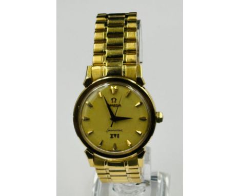An Omega Seamaster XVI in 18ct gold on an 18ct gold bracelet, marked 750. Launched to celebrated the 1956 Melbourne Olympics 