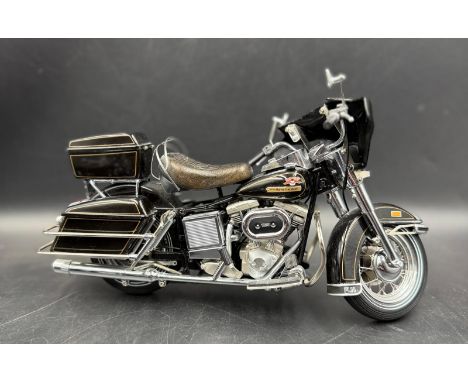 Three Franklin Mint diecast Harley Davidson motorcycle models