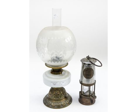 An Eccles miners lamp, with a Hanks and Son oil lamp, having brass base, milk glass reservoir and etched glass shade (2) 
