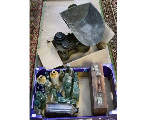 A set of vintage scales and weights, a small leather case and a box of vintage bottles 