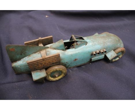 A blue tinplate clockwork car, Dunlop Cord tyres 