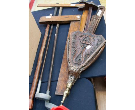 A woodworking scribbling stick, with two set squares, a pair of carved bellows, two hickory handled golf clubs, etc (7) 