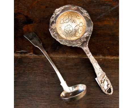 A William IV Scottish silver toddy ladle, hallmark Edinburgh 1832 marked 'Mossman' and a tea strainer, total weight approx 93