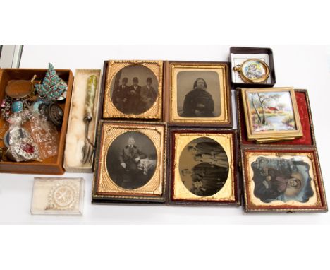 A hand painted powder compact, porcelain plaque, signed Gamet, together with six gilt metal cased photo frames and costume je