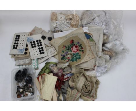 A nice box of haberdashery to include machine handmade lace trimmings vintage button, buckles, ribbons, embroidered needlepoi