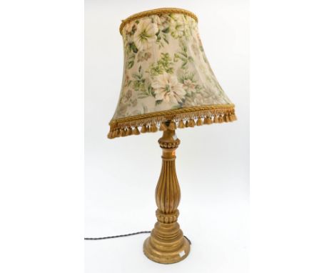 A gilt wooden table lamp 