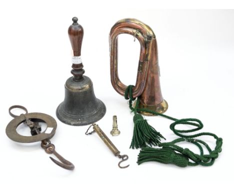 A copper and brass military trumpet, table bell and scales (3) 