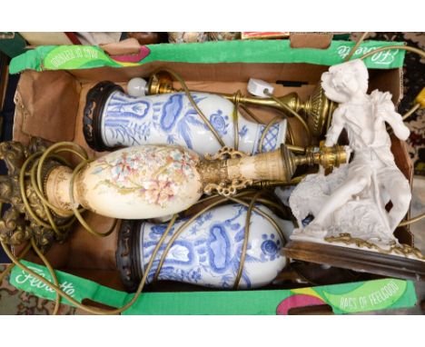 A pair of blue and white lamp bases, together with a blush ground vase, an Italian style figure and a brass lamp 