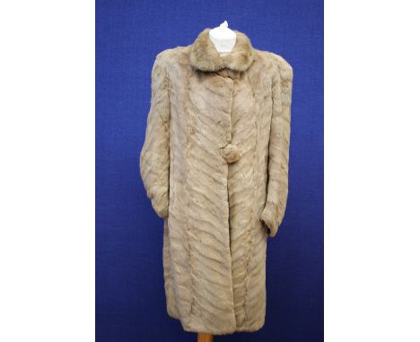 A 1940s coney fur coat with two covered button (af) 
