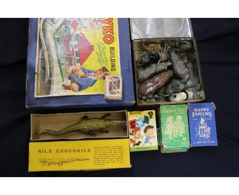 A Britains 200 Nile Crocodile No. 917 boxed, a tin of further animals, Bayko Building set and playing cards 