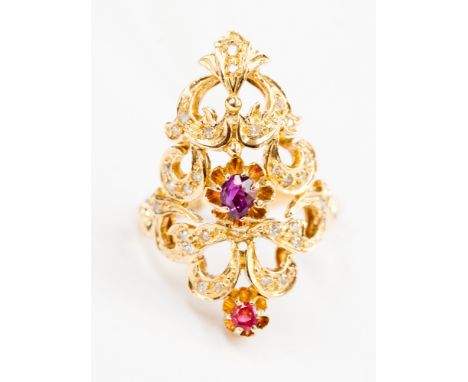 A yellow gold, ruby and diamond Byzantine style openwork dress ring 