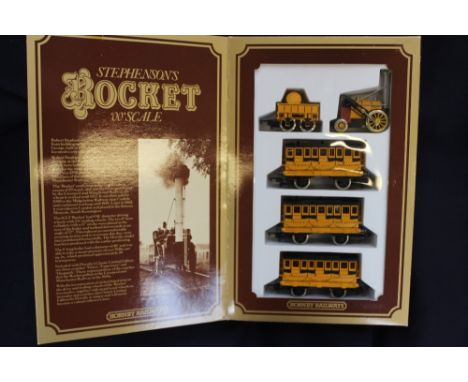 Hornby Railways OO scale Stephensons Rocket set with three coaches, boxed 