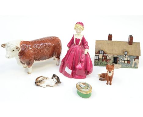 A Royal Worcester figure 'Grandmother's Dress' model no 3081, pink dress, together with a Royal Doulton sleeping kitten HN 25