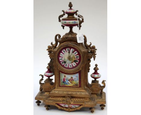 A late 19th Century French gilt metal bracket clock with inset sevres style plaques (key and pendulum) (3) 