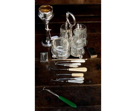 An EPNS Art Nouveau style bud vase together with a plated cruet set and a group of button hooks (qty) 
