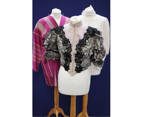 A 1930s woven raspberry striped robe together with a white lace Edwardian motif blouse, high neck, a late Victorian boned bod