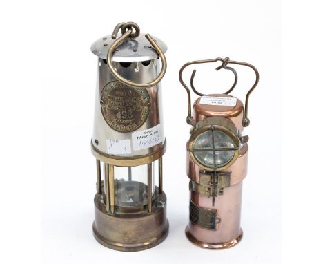 An Eccles miners lamp together with a Ceag Ltd BE 3 lamp (Barnsley) 