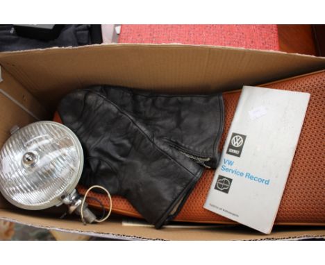 A 1973 VW diagnostic booklet, a 1969 VW service record, a chrome Lucas car lamp, a pair of Goldtop leather motorbike gloves a