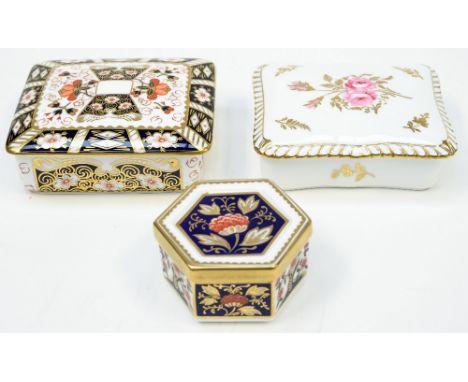 Three Crown Derby boxes and covers, 2451, 1298 pattern, (second quality) and 1155 Royal 'Pinxton Roses' pattern (first qualit