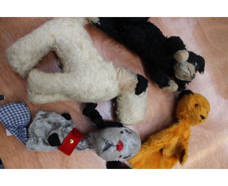 

A Chad Valley Sooty hand puppet, a Sweep, a Chiltern Terrier and a Felix the Cat 