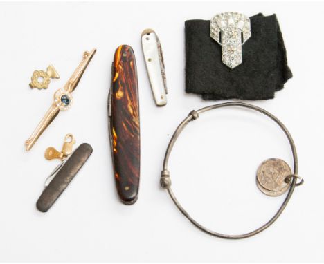 A silver bangle with two 3d coins, three various penknives (tortoiseshell, mother-of-pearl etc) costume jewellery and a 9ct f