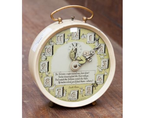 A 1950s Hare and Tortoise alarm clock 'Smith Alarm' with verse 