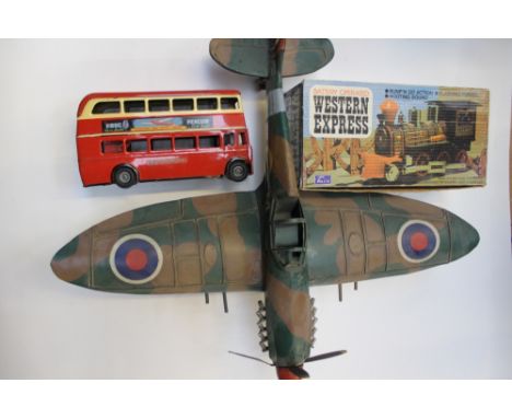 A large scale Triang Minic London bus, Western Express loco (boxed) and a tinplate Spitfire 