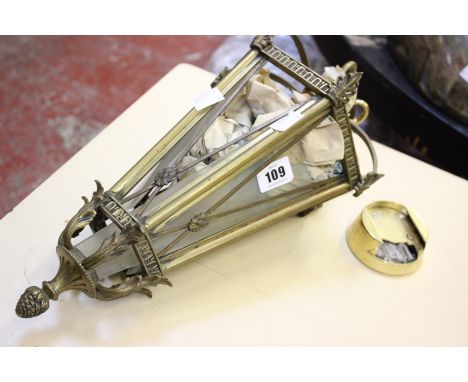 A gilt metal and glazed hall lantern 