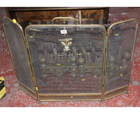 A wrought iron firebasket, a fire grate with andiron supports, two brass chenets and a brass fire guard etc.