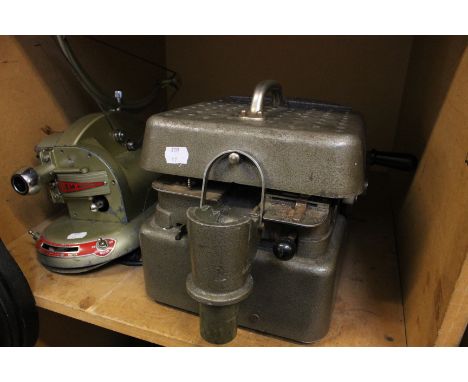 A 1930's Metropolitan - Vickers Desk Fan together with a 1930's Pathe Gem projector and a bank tellers coin sorting machine (