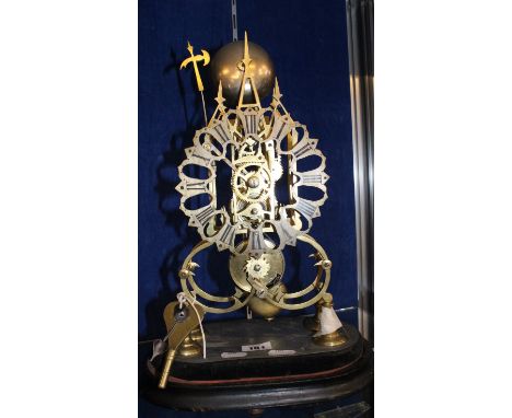 A late 19th Century brass skeleton clock, 8 day with single fusee and anchor escapement, lacking glass dome